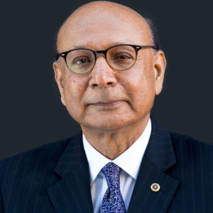 Khizr Khan Campaigns For Hillary Clinton LEESBURG, VA - NOVEMBER 04: (EDITORS NOTE: This image has been altered: Background has been darkened) Gold Star father Khizr Khan, whose son Army Captain Humayun Khan was killed in Iraq saving fellow soldiers, campaigns for Hillary Clinton, Tim Kaine, and LuAnn Bennett at the Leesburg Coordinated Campaign Office on November 4, 2016 in Leesburg, Virginia. (Photo by Leigh Vogel/WireImage)